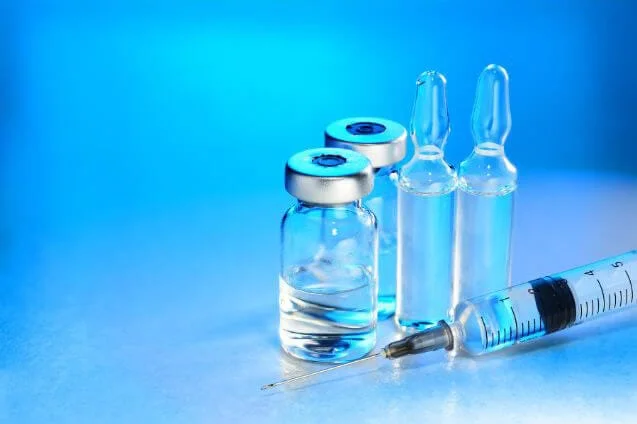 A photo of vials ampules and a syringe for the article the 28-Day Puncture Rule