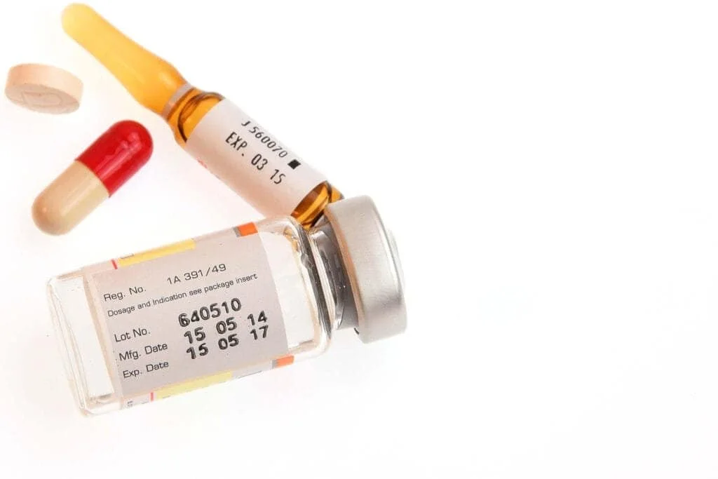 A photo of vials and medications for the article the 28-Day Puncture Rule
