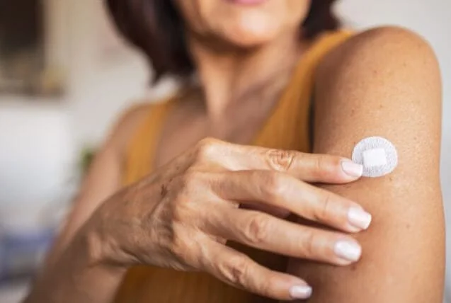 woman doing hormone replacement therapy for online menopause article