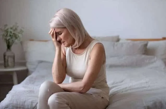 The emotional side of hormonal shifts. This image captures the mood swings that can accompany perimenopause and menopause