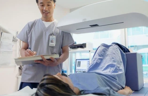 Image of a patient about to have a bone density scan for the blog post on GLP-1 bone preservation and compositional integrity