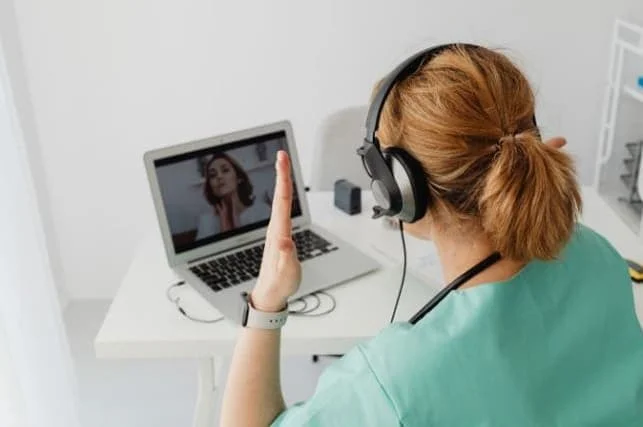 Photo of a healthcare professional on a virtual consult for the article Spring into Wellness plan