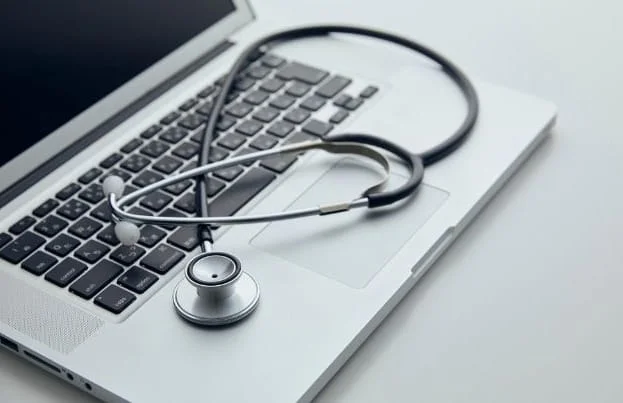 Stethoscope on laptop for telehealth