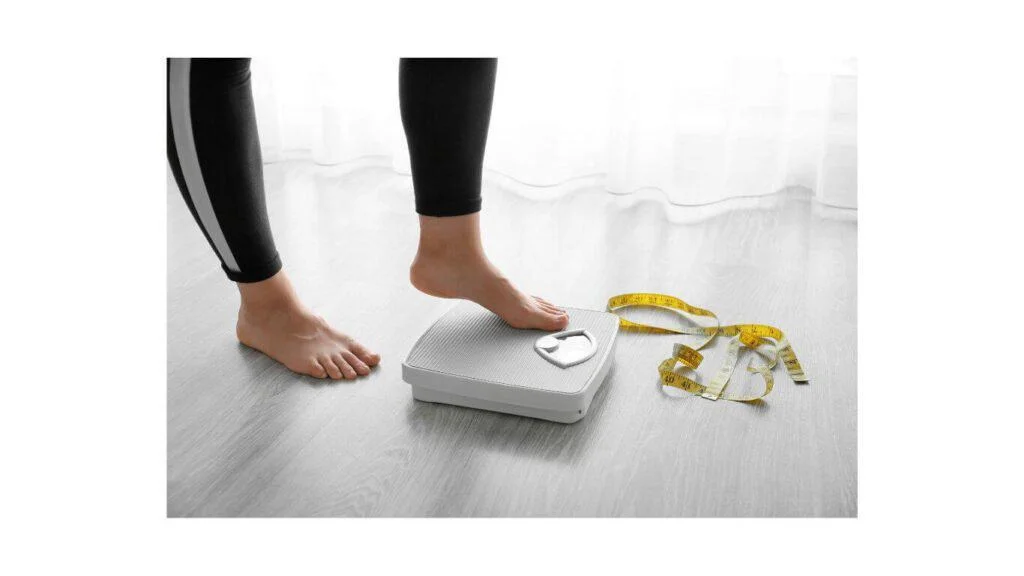 Patient checking their weight