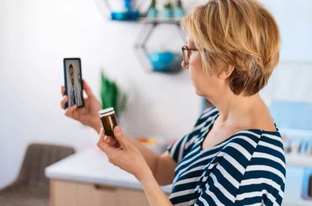Telemedicine Consultation - Woman and Healthcare Professional
