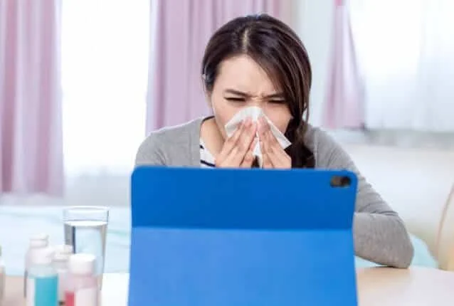 Sick woman getting medical help through telehealth