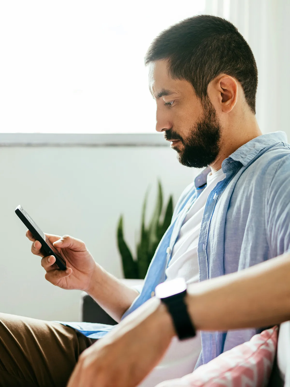 Patient completing a Hamilton Telehealth intake on a phone