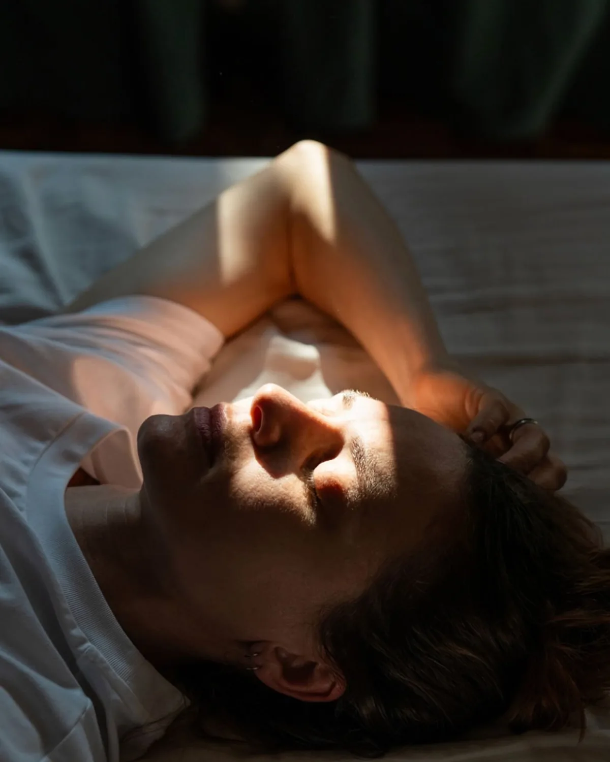 Patient resting while managing non-emergency symptoms at home