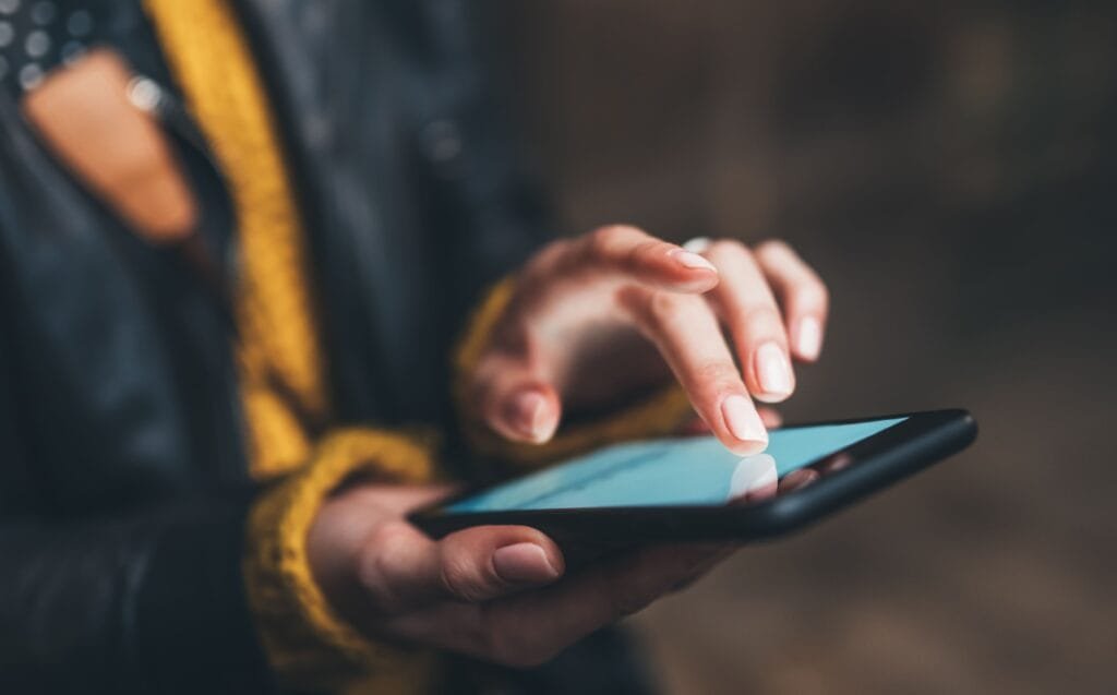 A person on her mobile phone