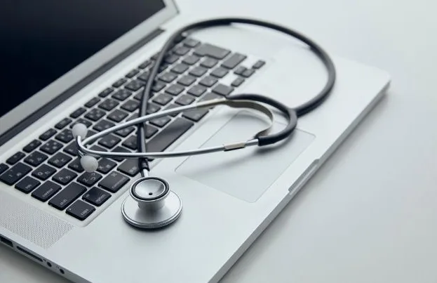 Stethoscope on laptop for telehealth