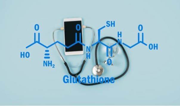 Composite image of a chemical diagram of glutathione superimposed on an image of a stethoscope and a mobile phone