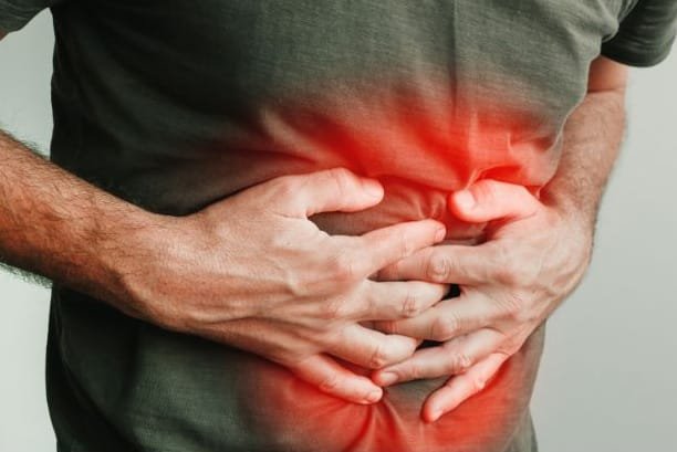 Image of person suffering from gastrointestinal conditions