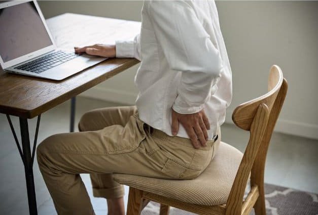 Image of person suffering from hip pain