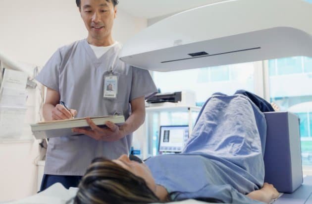 Image of a patient about to have a bone density scan for the blog post on GLP-1 bone preservation and compositional integrity